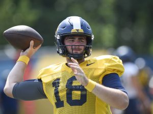Familiarity with offense helps WVU coordinator Graham Harrell, quarterback JT Daniels